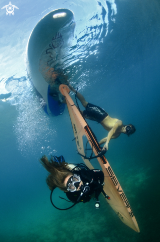 A upside down surfer | upside down surfer