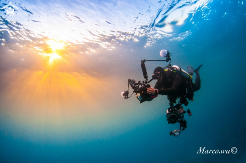 A Sunset  and  diver photographyer 